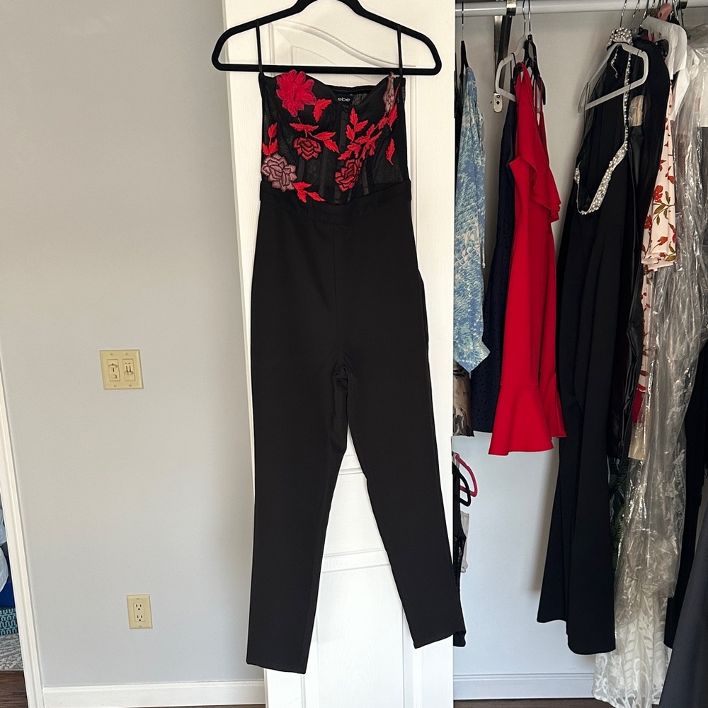 Bebe black jumpsuit mesh floral